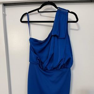 Blue one shoulder dress.